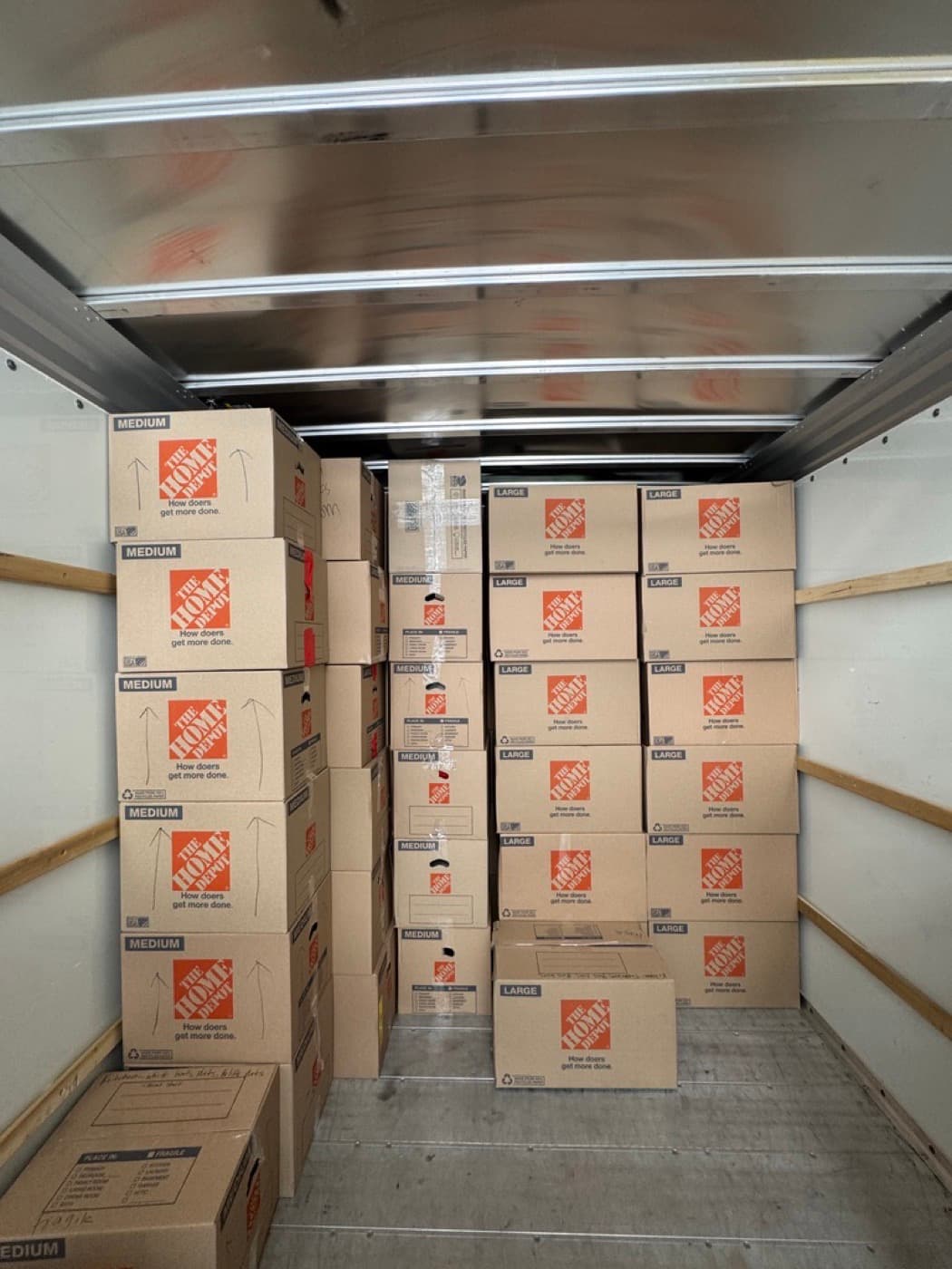Coyotes Moving crew wrapping and loading furniture quickly for a rush Las Vegas move